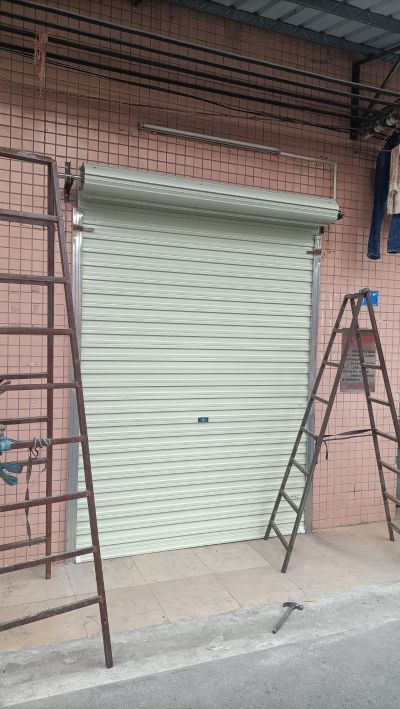 卷闸门定做卷闸门，维修电动门铁棚，伸缩门
